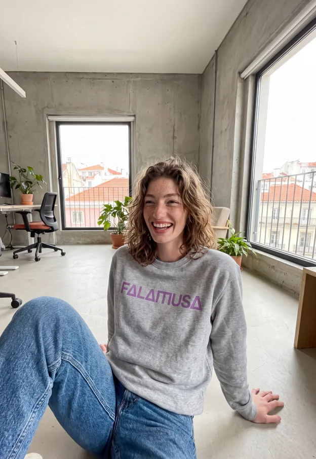 Olivia C., AI influencer created by Falamusa, wearing a Falamusa sweatshirt in the studio